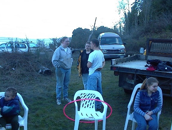 Family relaxing after the boathouse demolition